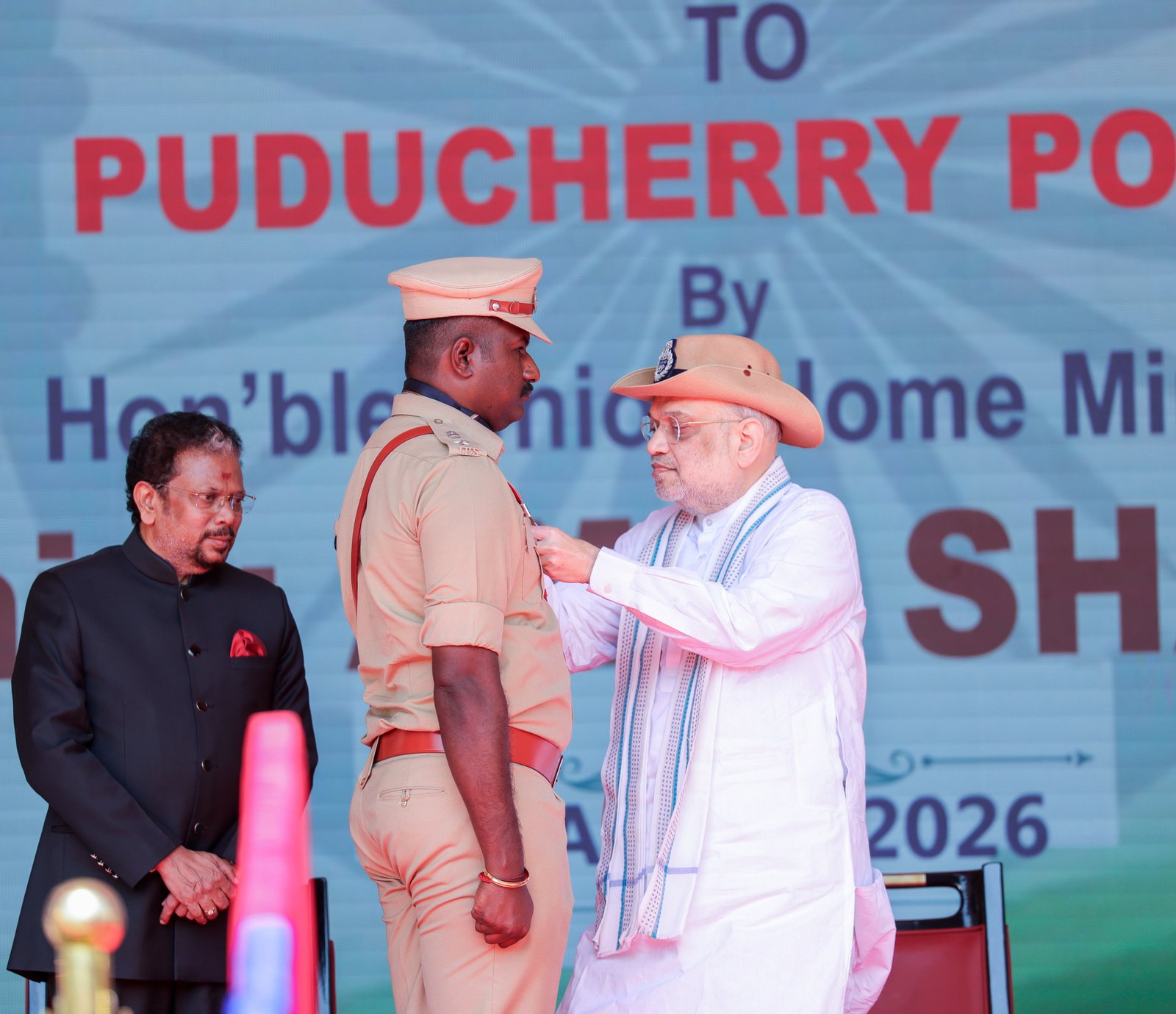 Amit Shah presents the President’s Colours to Puducherry Police
